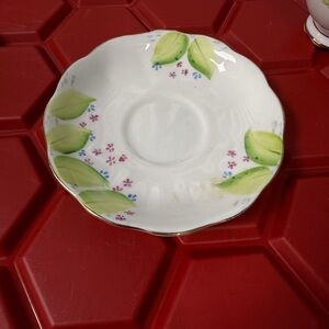 Fine Porcelain Saucer with Hand-Painted Green Leaf Motif